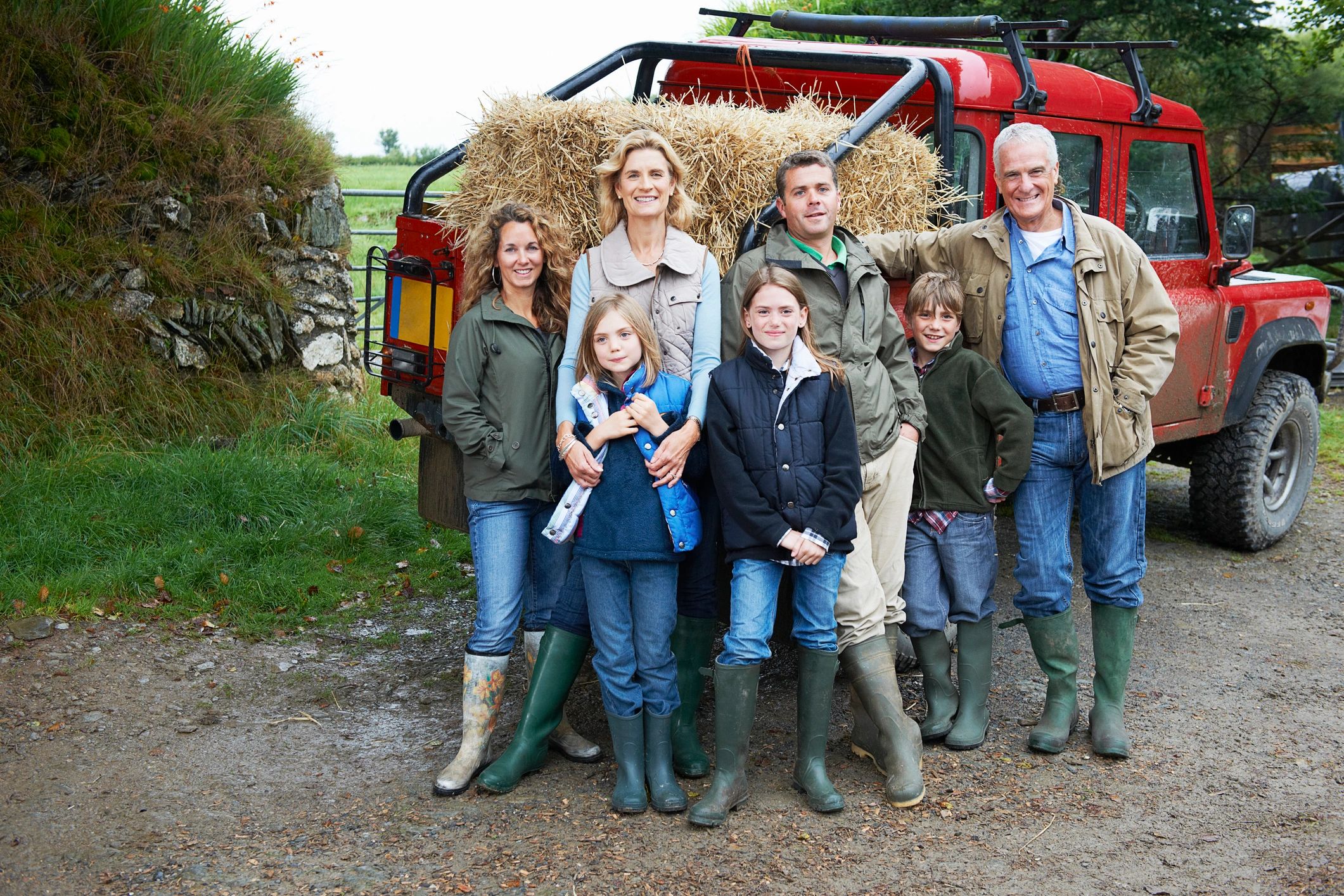 Family portrait outdoors on a farm
