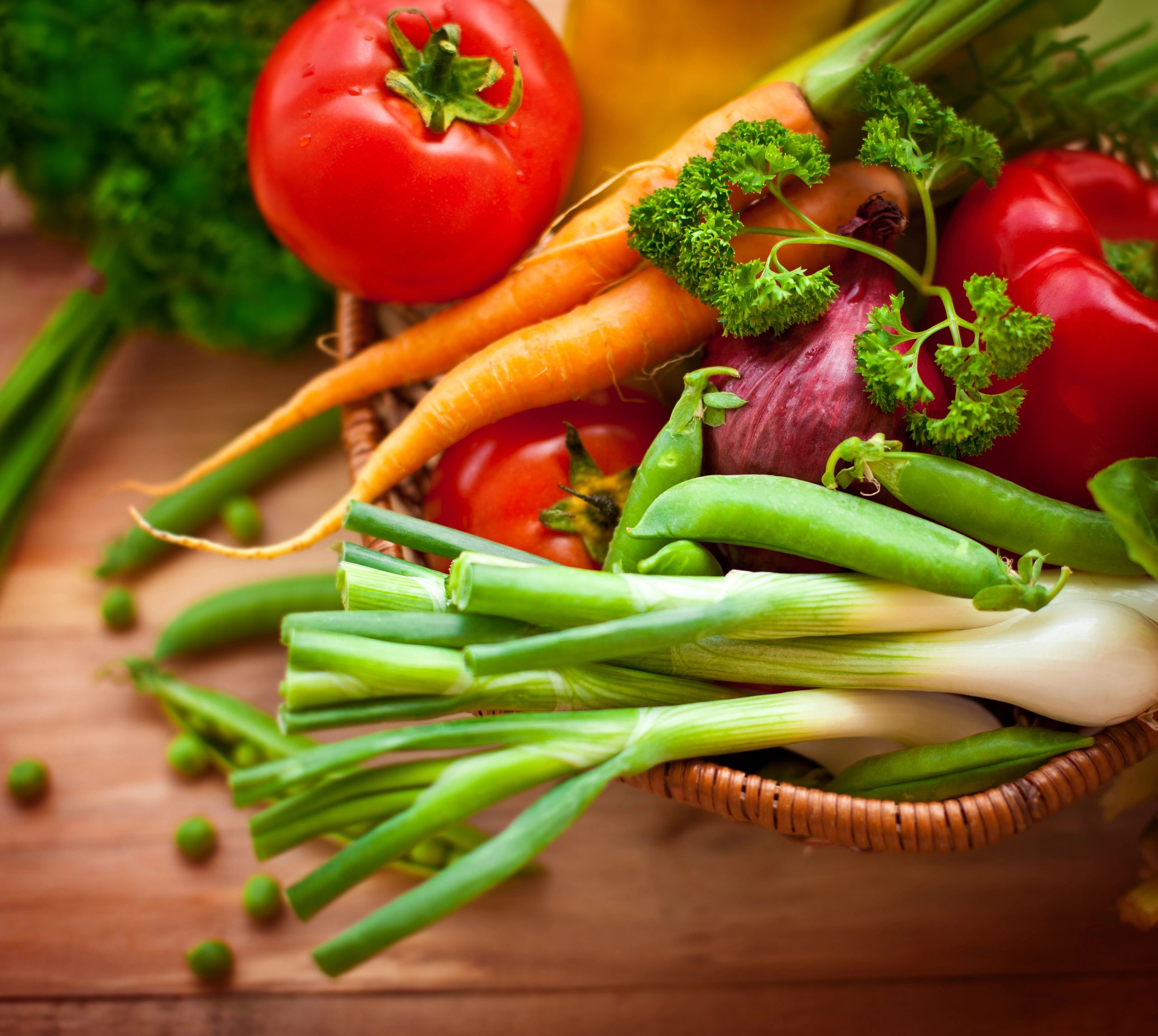 Assorted fresh organic vegetables in a basket